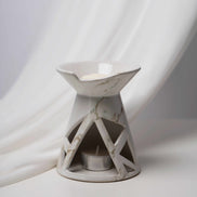 Duftkamin mit durchbrochenem Keramikmuster