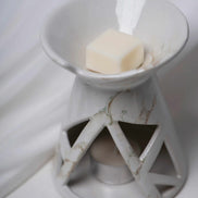 Duftkamin mit durchbrochenem Keramikmuster