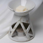 Duftkamin mit durchbrochenem Keramikmuster